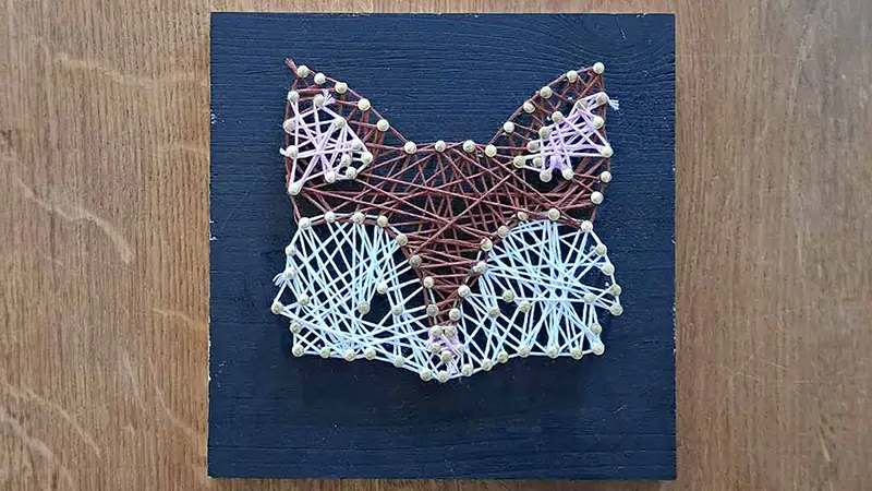 Weihnachtsgeschenk Fadenbild als Schlüsselbrett